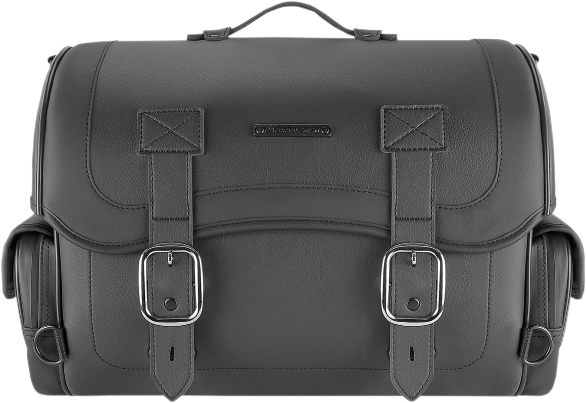 Bill's Exhausts Saddlemen universal rack bag attached to motorcycle seat, black with multiple compartments and adjustable straps.