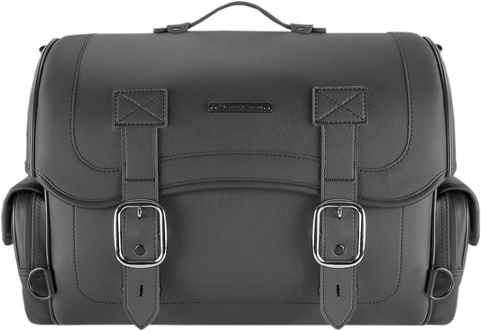 Bill's Exhausts Saddlemen universal rack bag attached to motorcycle seat, black with multiple compartments and adjustable straps.