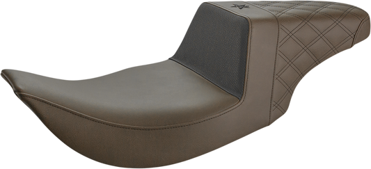 SADDLEMEN Unknown Industries seat for motorcycle, front carbon fiber with black gripper lumbar and rear lattice stitch detailing.