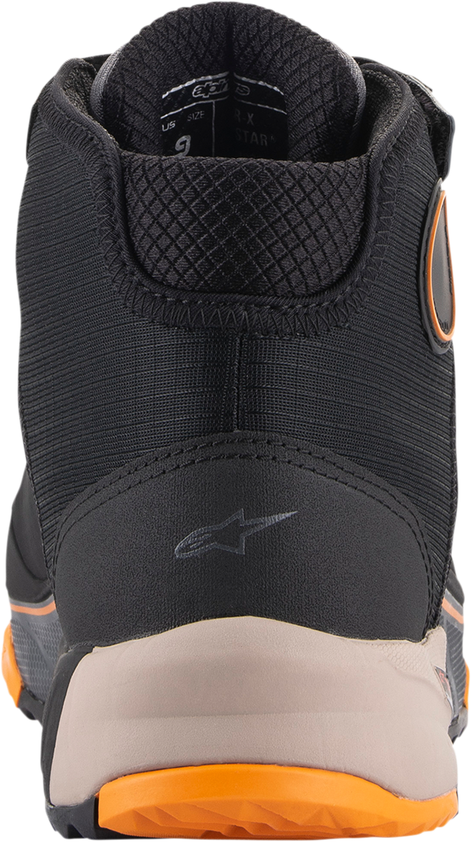 Alpinestars CR-X Drystar® Shoes in black, brown, and orange, US 9.5, with visible design details and durable construction.