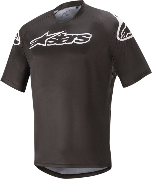Alpinestars Racer V2 Jersey in black and white, small size, displayed with shorts and racing-inspired design elements.