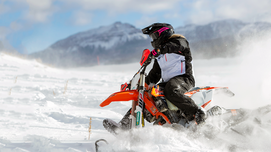 Bill's Exhausts ARCTIVA Vibe snow goggles in black and pink with tinted lenses, designed for winter sports and snowboarding.