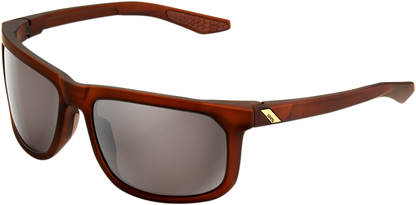 Bill's Exhausts 100% Hakan sunglasses in rootbeer with silver mirror lenses, showcasing stylish eyewear with reflective lenses.