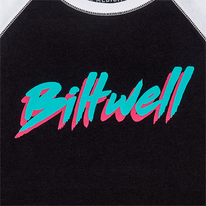 Black and white women's BILTWELL 1985 Raglan T-Shirt with long sleeves, medium size, featuring a casual graphic design.