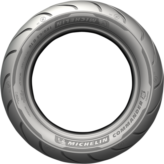 Rear Michelin Commander III motorcycle tire 180/55B18 with 80H load rating, shown on a motorcycle wheel.