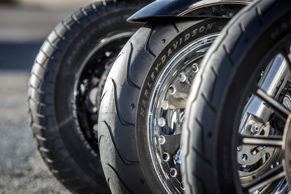 Michelin Scorcher 31 front motorcycle tire 130/70B18 63H mounted on a wheel, designed for optimal handling and performance.