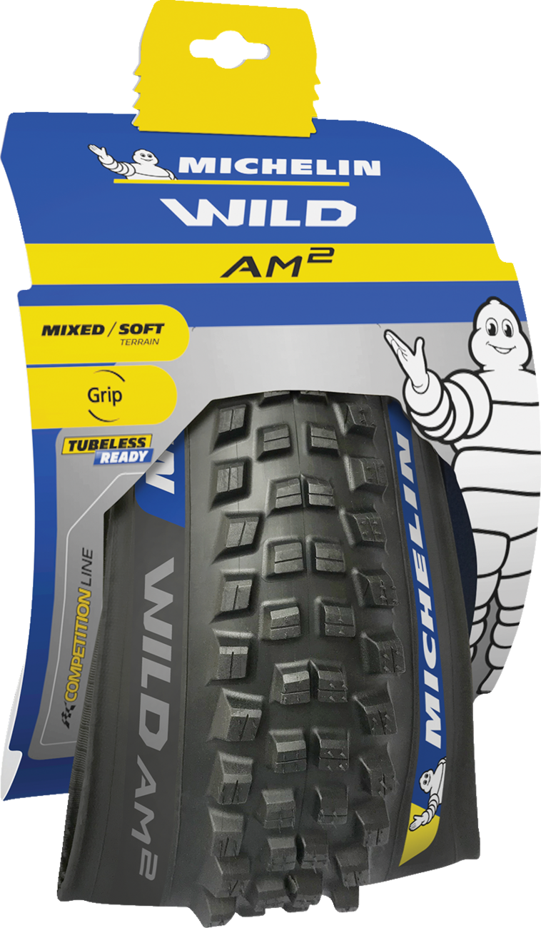 Michelin Wild AM2 Competition Tire for mountain biking, 29 x 2.40, with rugged tread pattern and durable rubber compound.