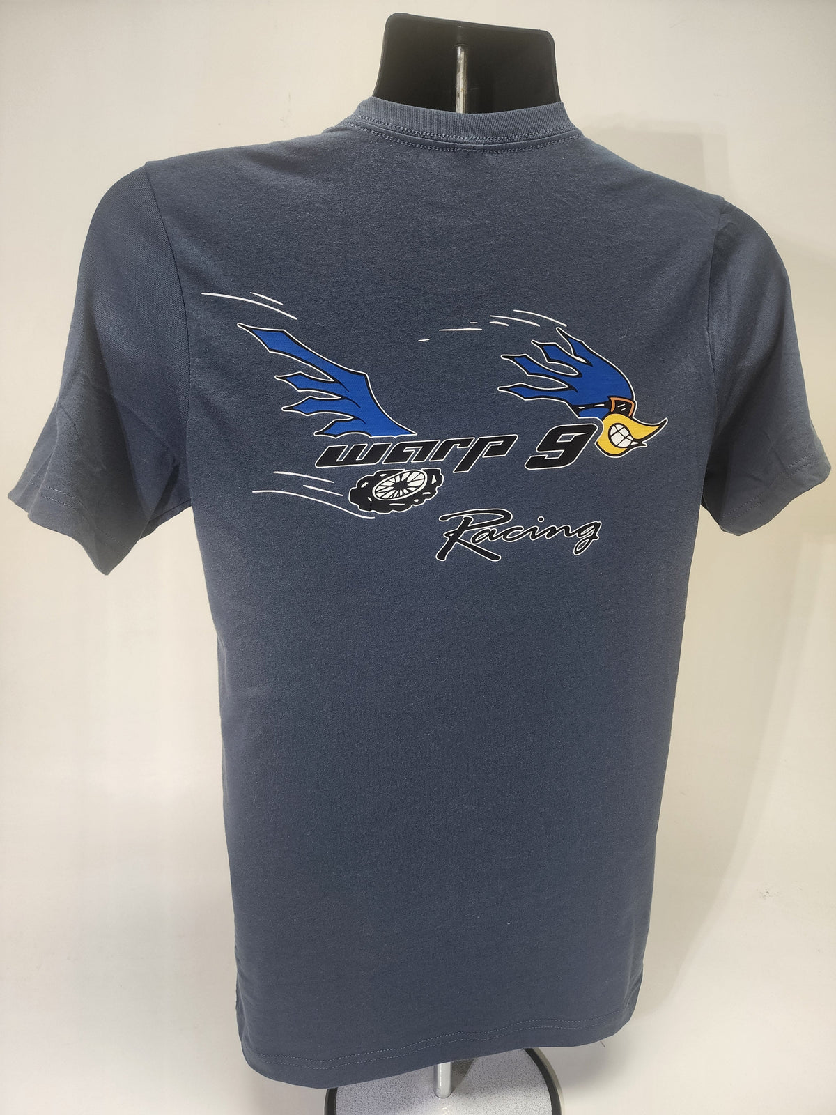 Blue WarpWear Road Runner T-shirt from Warp9Racing, showing the back design with a colorful road runner graphic.