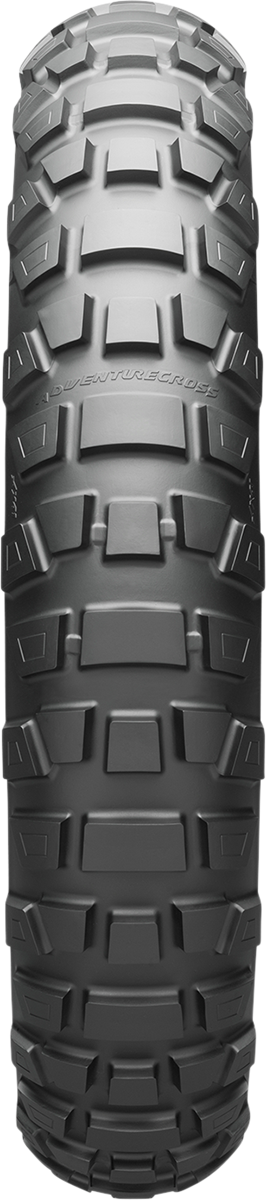 BRIDGESTONE Battlax Adventurecross AX41 front tire 100/90-19 for off-road and on-road motorcycle riding, with rugged tread pattern.