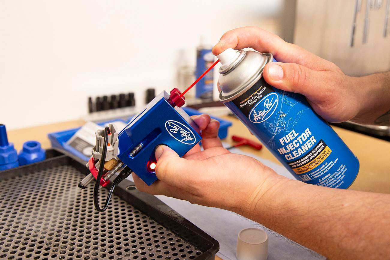 Motion Pro Fuel Injector Cleaner in an 8 oz bottle, designed to clean motorcycle fuel injectors effectively.
