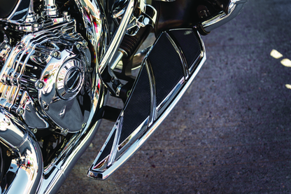 Kuryakyn Phantom floorboards for Indian motorcycles with chrome finish, durable aluminum construction, and vibration dampening rubber pads.