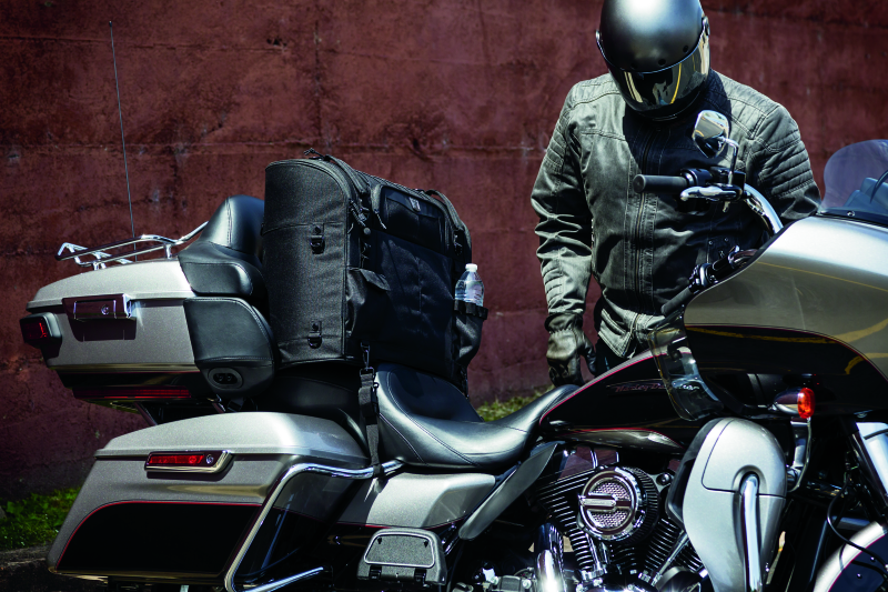 Kuryakyn Momentum Wanderer Seat Bag with 60L capacity, padded backrest, and organized compartments for motorcycle touring passenger storage.