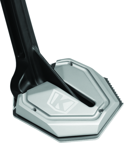 Kuryakyn Lodestar Kickstand Shoe in silver for Honda Africa Twin motorcycle, showing the metallic finish and fitment details