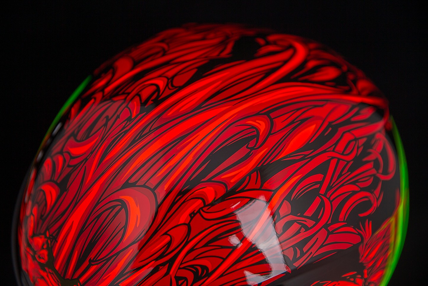Red ICON Airform™ helmet for men, medium size, featuring a sleek aerodynamic design and ventilation system.
