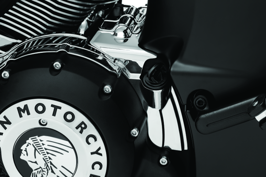 Kuryakyn Rear Oil Panel Accent in chrome for Indian motorcycles, showcasing shiny metallic finish and detailed design.