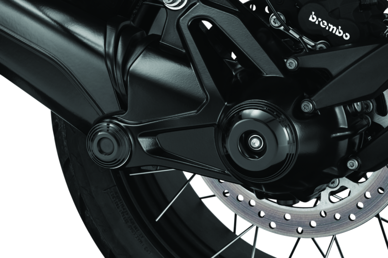 Kuryakyn Lodestar rear axle sliders in black on BMW R1200GS or R Nine T motorcycle for protection and style.