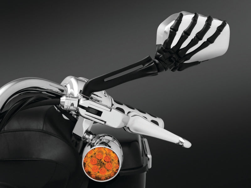 Kuryakyn Skeleton Hand motorcycle mirrors in black and chrome with detailed skeleton hand design.
