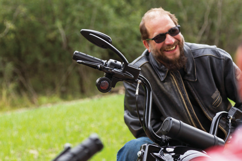 Kuryakyn Heavy Industry grips for throttle-by-wire motorcycles in black, featuring textured rubber for enhanced grip.