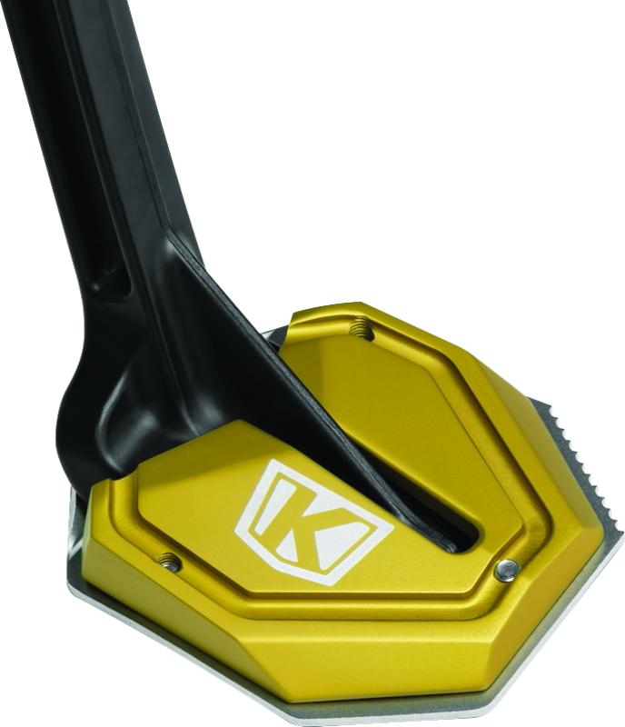 Kuryakyn Lodestar Kickstand Shoe Gold for Honda Africa Twin motorcycle, showcasing the gold kickstand protector on the bike.