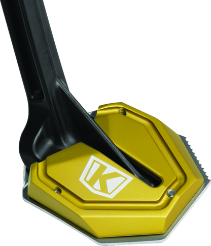Kuryakyn Lodestar Kickstand Shoe Gold for Honda Africa Twin motorcycle, showcasing the gold kickstand protector on the bike.