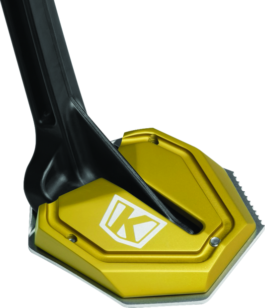 Kuryakyn Lodestar Kickstand Shoe Gold for Honda Africa Twin motorcycle, showcasing the gold kickstand protector on the bike.
