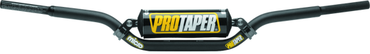 ProTaper Schoolboy Low Micro Bar by Bill's Exhausts shown on a motorcycle handlebar for enhanced control and style.