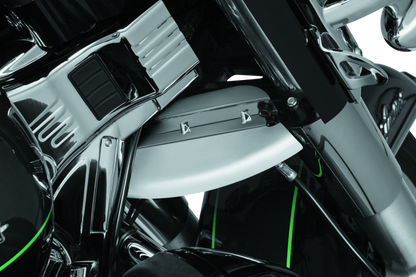 Kuryakyn chrome lower triple tree wind deflector installed on Harley Davidson Touring motorcycle, showcasing sleek finish and mounting hardware.
