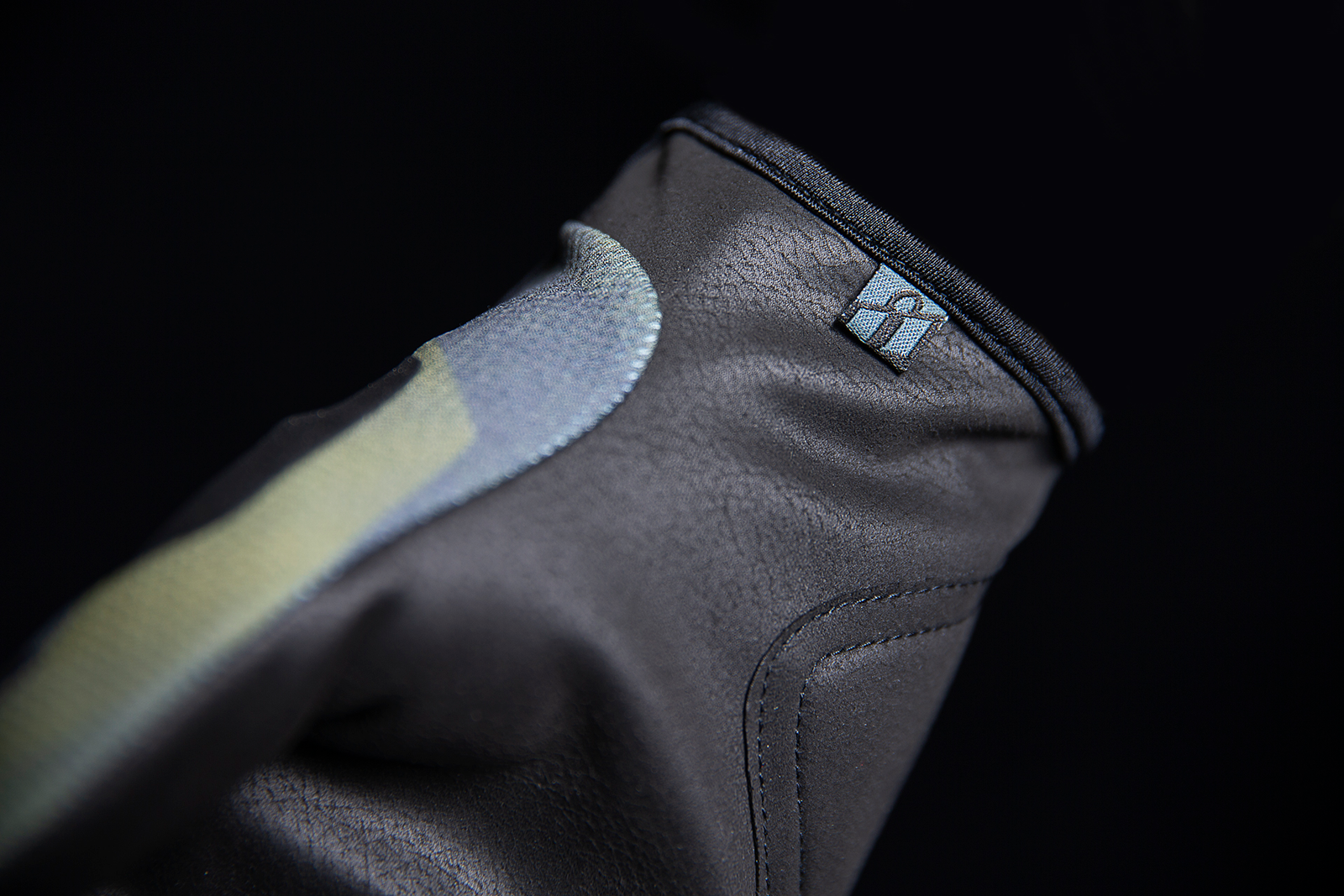 Green ICON Hooligan™ Battlescar motorcycle gloves by Bill's Exhausts, medium size, with rugged design and protective features.