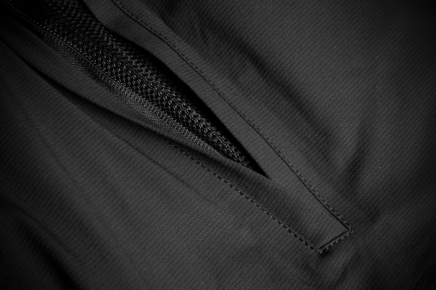 Black ICON Stormhawk Jacket CE in XL size, with visible zipper and protective features, designed by Bill's Exhausts.