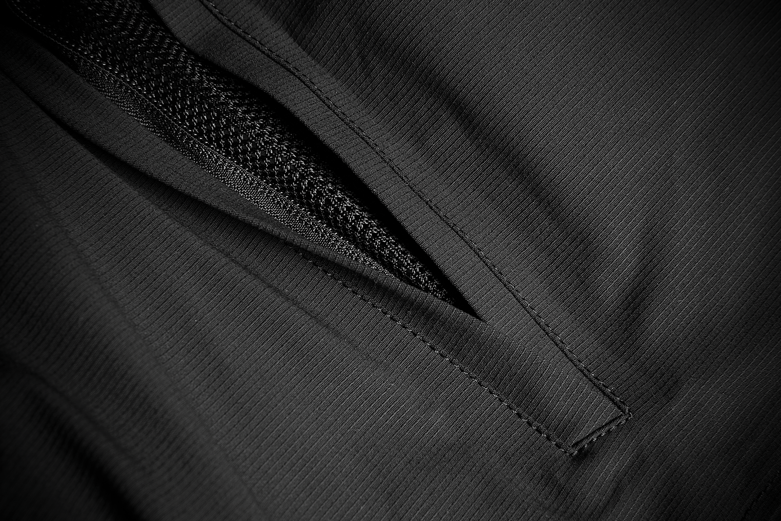 Black ICON Stormhawk Jacket CE in XL size, with visible zipper and protective features, designed by Bill's Exhausts.