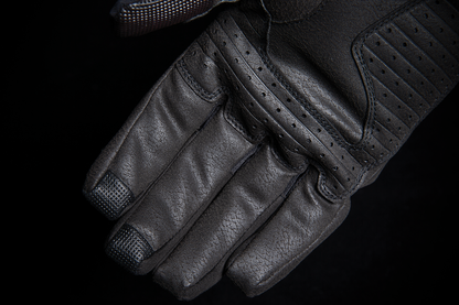 Black ICON Stormhawk™ gloves in 3XL size, featuring durable material and detailed design, ideal for motorcycle or outdoor use.