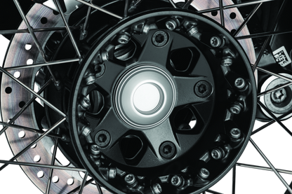 Kuryakyn Lodestar front axle sliders for BMW R1200GS and R Nine T, designed to protect suspension and brake components.