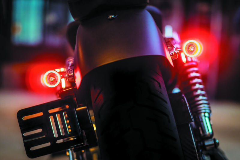 Kuryakyn Bullet 1000 LED turn signal light with white/amber clear lens and satin black housing for powersports vehicles