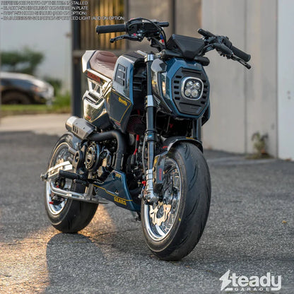 Black Chimera T-56 and Baja Designs Squadron Sport lighting bundle for 2025+ Honda Grom, showing installed motorcycle lights.