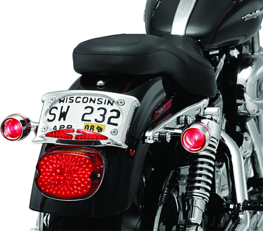 Kuryakyn Deep Dish Bezel with Red Lens for Harley-Davidson Bullet Turn Signals, part #2109, showing the red lens and bezel design