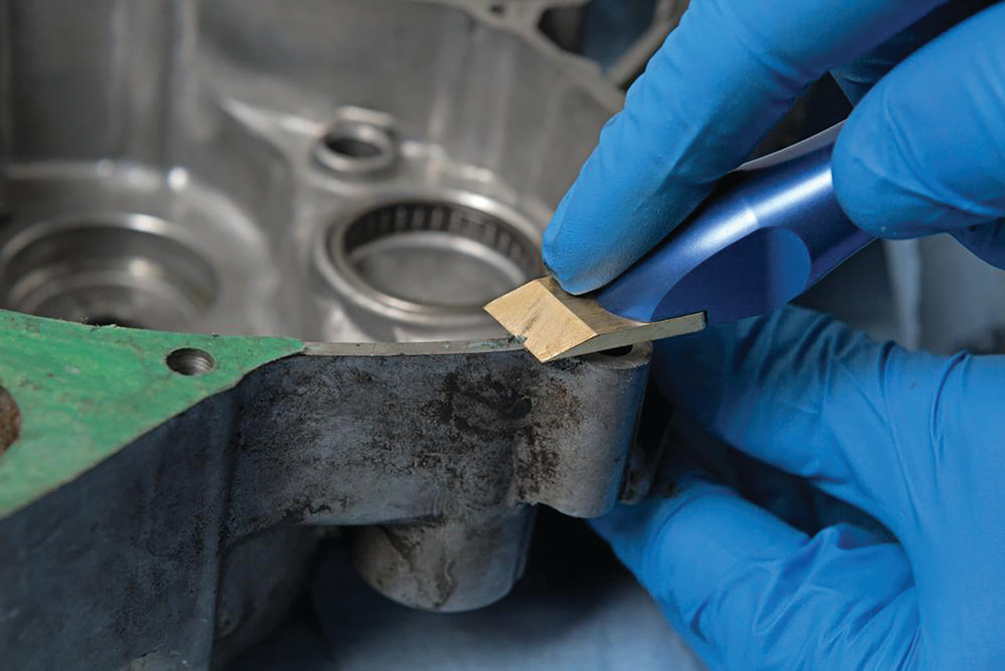 Motion Pro MP gasket scraper for precision gasket removal, featuring a durable blade and ergonomic handle for motorcycle maintenance.
