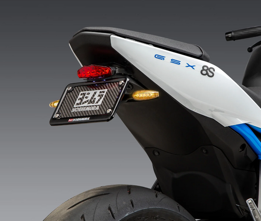YOSHIMURA Fender Eliminator Kit for Suzuki motorcycles, showcasing sleek black design and mounting hardware on a white background.