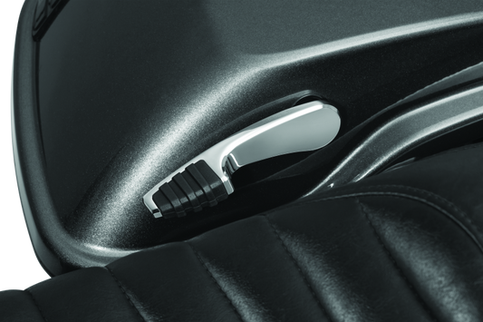 Chrome Kuryakyn Quick Draw Saddlebag Latch Handle for Harley-Davidson Touring Models, part #5192, shown on a motorcycle.