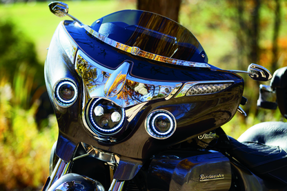 Kuryakyn Orbit Headlight Adapter for Indian Chieftain and Roadmaster motorcycle models, shown connected to headlight assembly.