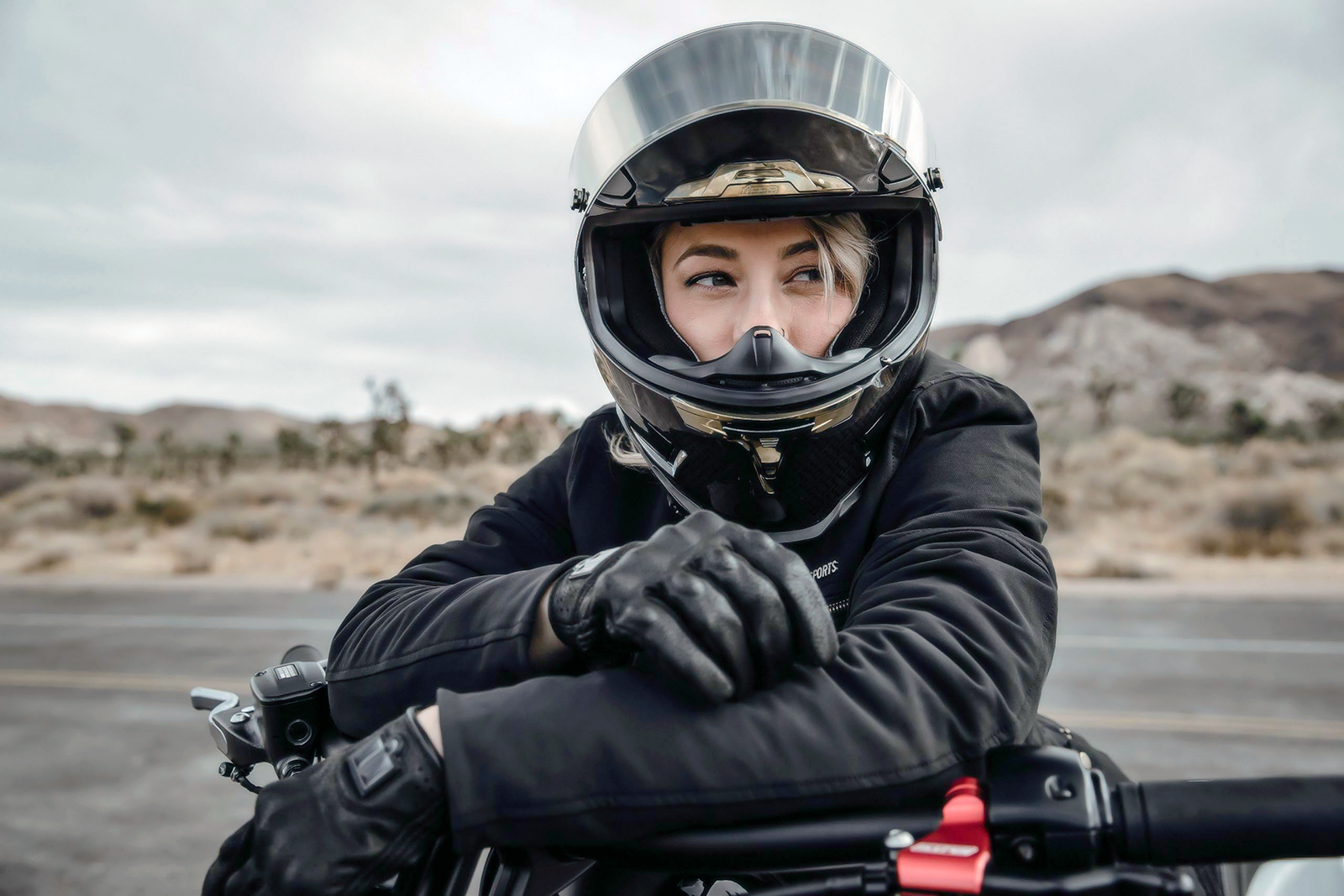 Black ICON Pursuit Classic™ gloves in 2XL size, featuring textured palms and flexible design for motorcycle riding comfort.