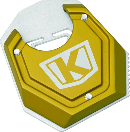 Kuryakyn Lodestar Kickstand Shoe in gold, designed for BMW F750GS, enhances stability and functions as a tire bead breaker.