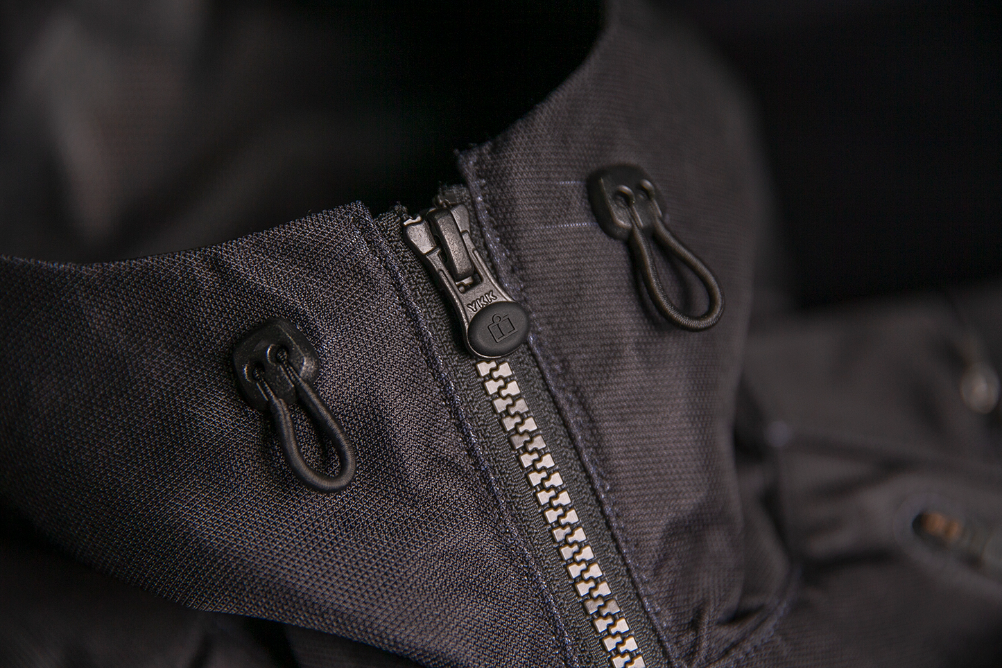 Black ICON Airform Jacket in Small by Bill's Exhausts, showing the jacket's front view with zip closure and logo details.
