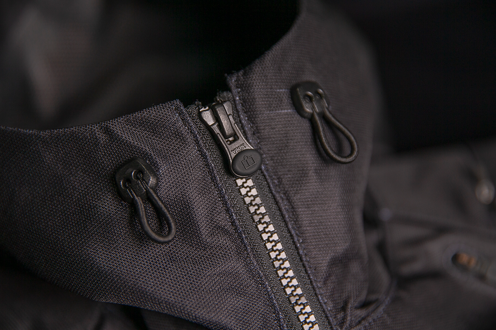 Black ICON Airform Jacket in Small by Bill's Exhausts, showing the jacket's front view with zip closure and logo details.