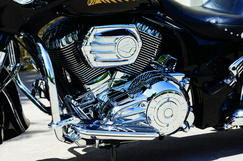 Chrome Kuryakyn transmission cover for Indian motorcycles, part #5696, with polished metallic finish and detailed design.
