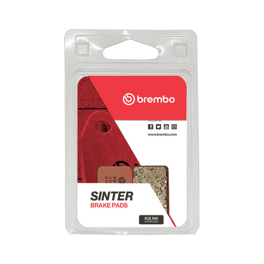 Brembo OE Powersports rear brake pad for Arctic Cat 250cc 99-04 with manual hand brake, showing the brake pad and mounting hardware.