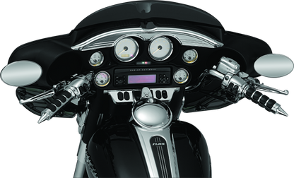 Chrome Kuryakyn switch panel accent for Harley Davidson Touring models, part 3783, shown installed on motorcycle dashboard.
