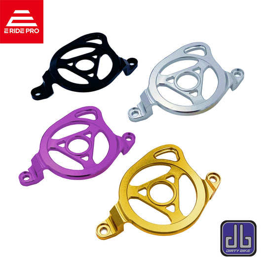 Aluminum CNC motor sprocket cover for Surron LBX electric bike, branded eDirtyBike, shown in multiple color options.