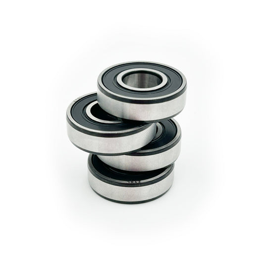 eDirtyBike swingarm bearing kit for E Ride Pro SR and 3.0 electric bikes, showing bearings installed in the swingarm assembly.