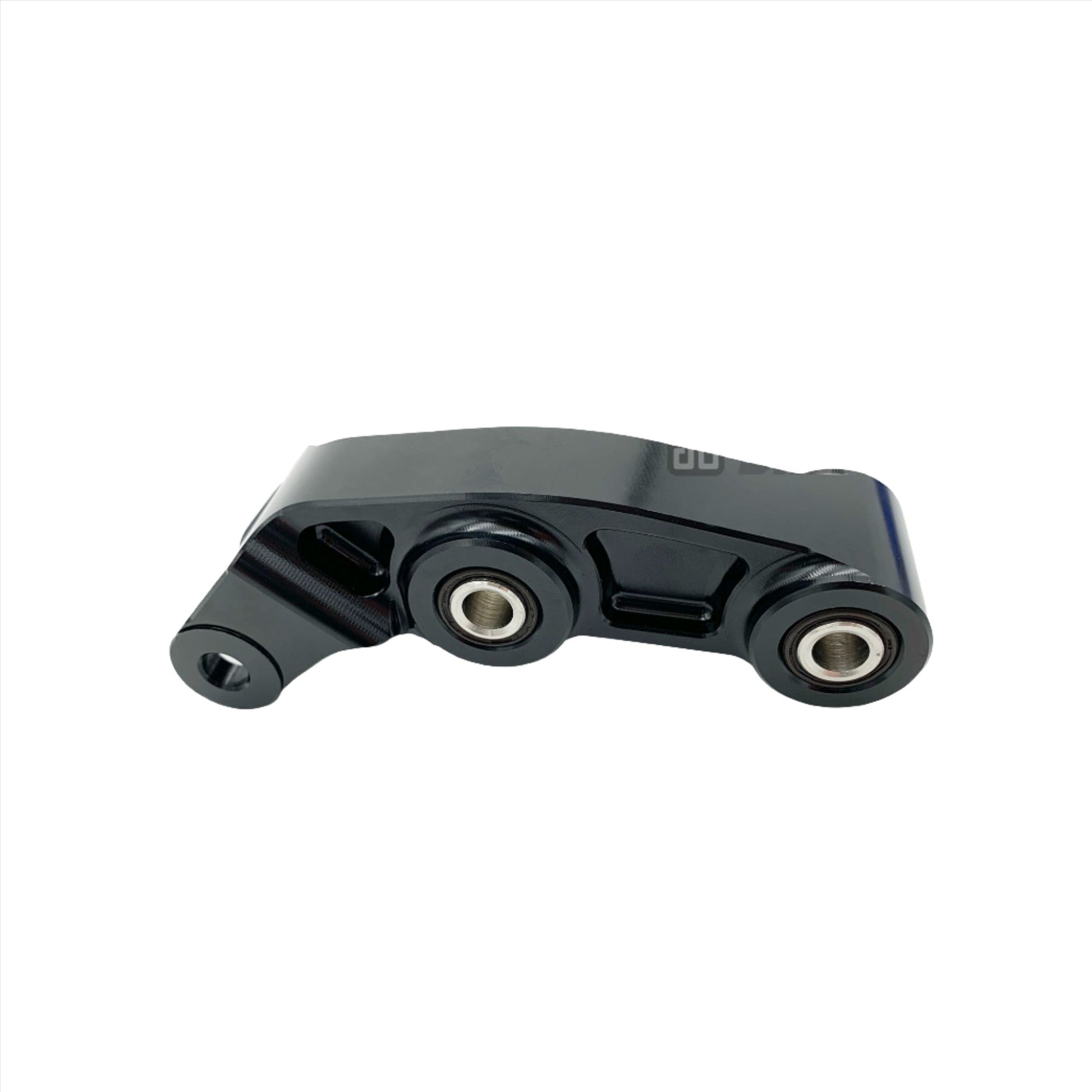 Black CNC aluminum suspension linkage for Surron LBX electric bike by eDirtyBike, designed for improved durability and suspension performance.