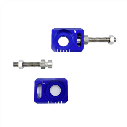 Blue aluminum axle blocks for Surron LBX, Talaria Sting, and E Ride Pro eBike from eDirtyBike, designed for secure wheel attachment.